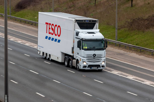Redbourn, UK - March 11, 2023: Tesco lorry traveling on the British motorway M1