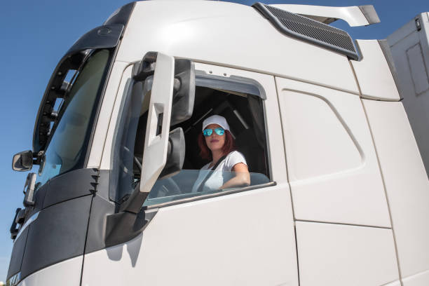 trucker lifestyle,  Woman with drives commercial truck